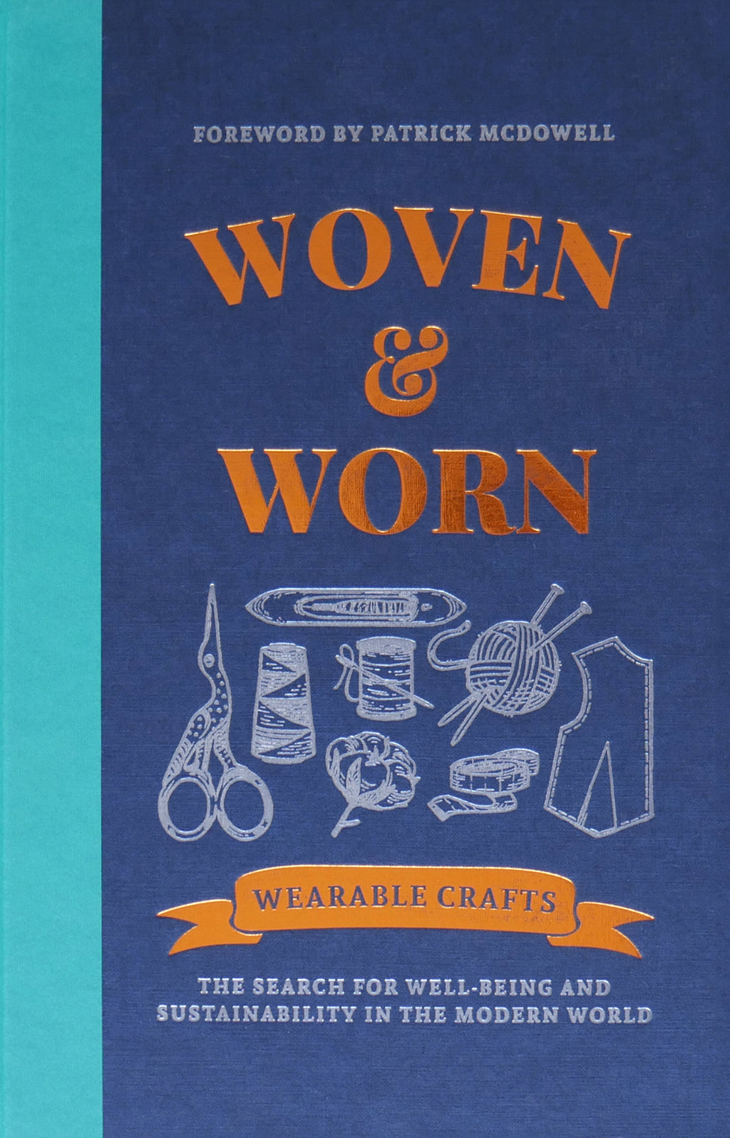 Blue 'Woven & Worn' book cover showing a variety of items for sewing, knitting, and making textiles, with title in gold font.